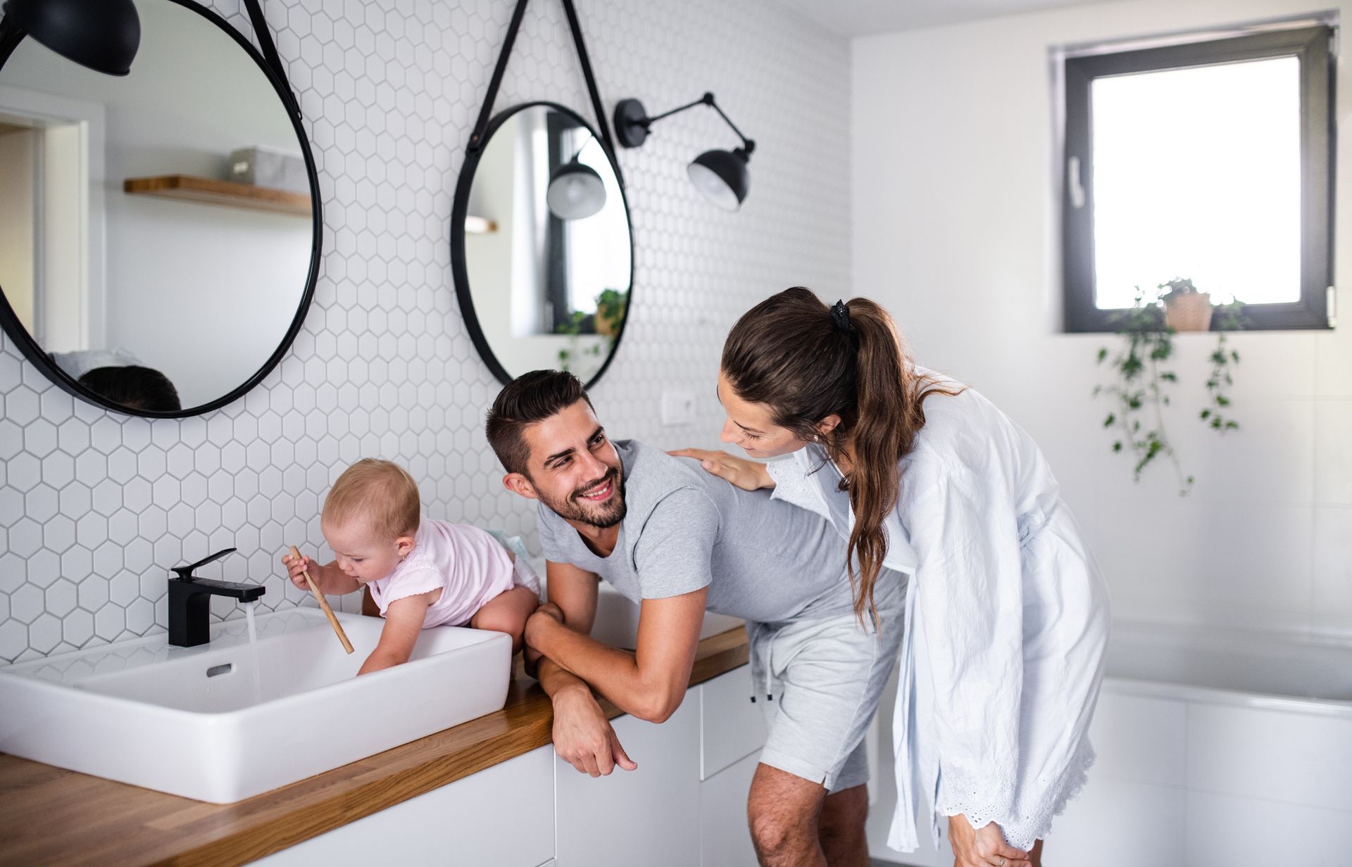 Happy family in bathroom - Mendon, MA | American Bath Works Happy family in bathroom - Mendon, MA | American Bath Works
