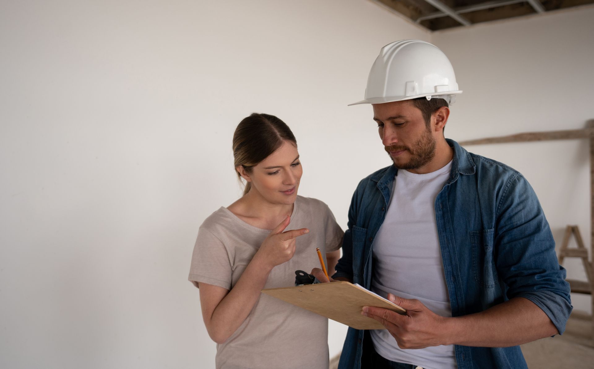 Man and woman planning - Mendon, MA | American Bath Works Man and woman planning - Mendon, MA | American Bath Works