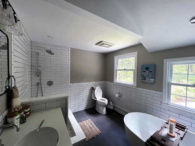 Dark tiles bathroom - Mendon, MA | American Bath Works
