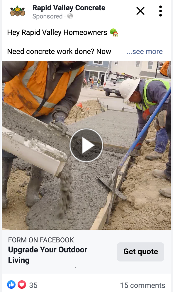 A video of a construction worker pouring concrete on a sidewalk.