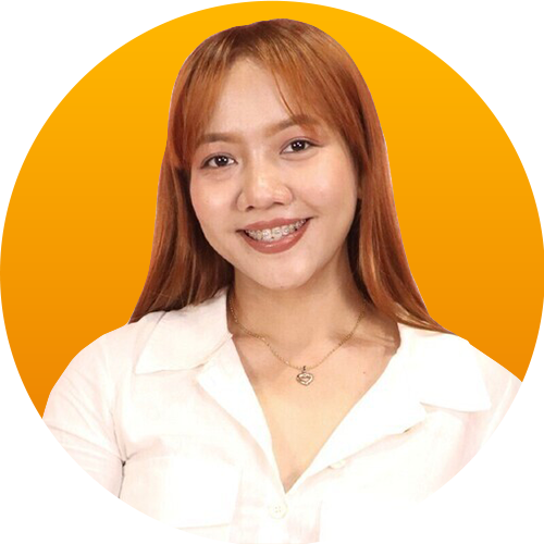 A woman with red hair is smiling in a yellow circle.