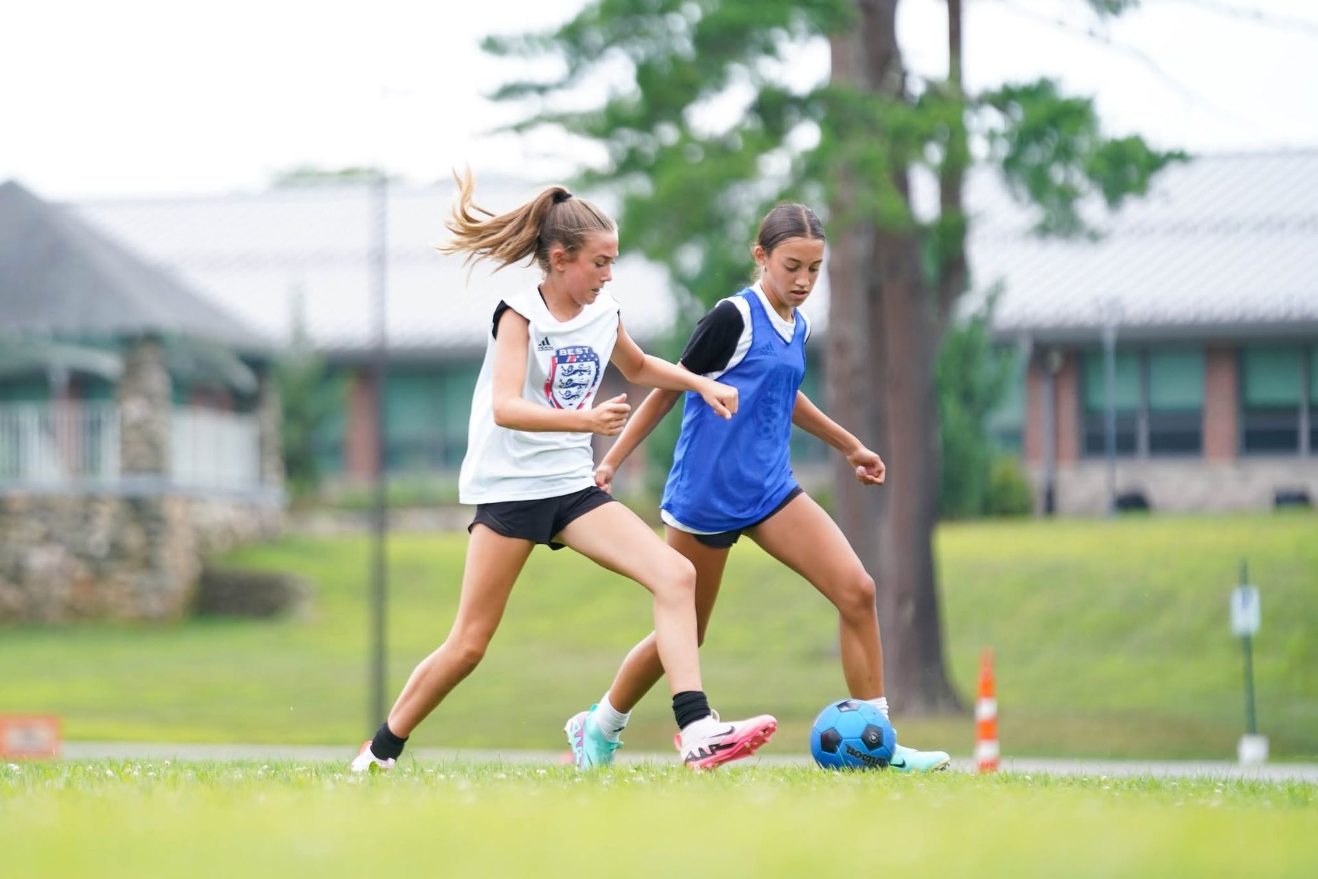 Two BEST FC players battling for the ball