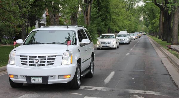 White Caddilac SUV