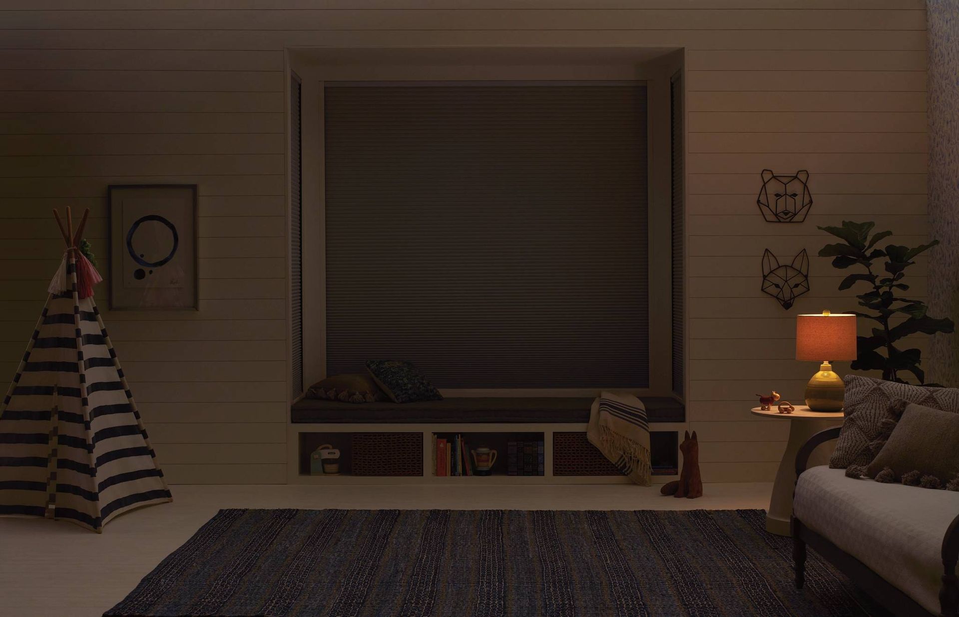 Hunter Douglas Duette® Cellular Shades as room-darkening window treatments in a child's playroom