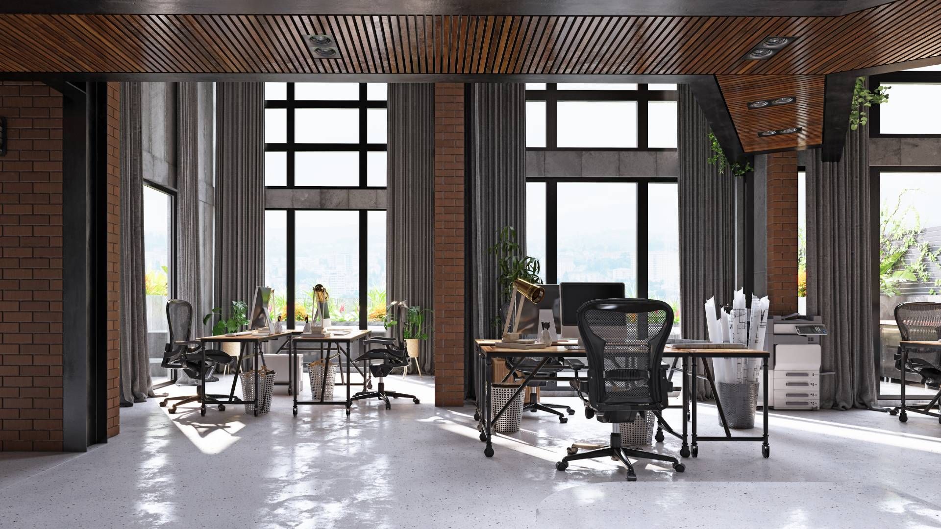 A trendy and modern open-concept business office with commercial curtains at the large windows
