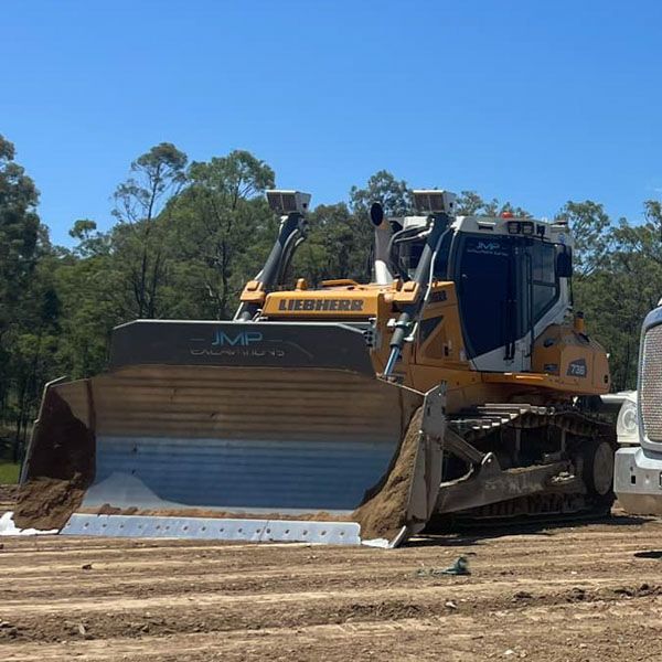 A bulldozer with the word liebherr on it