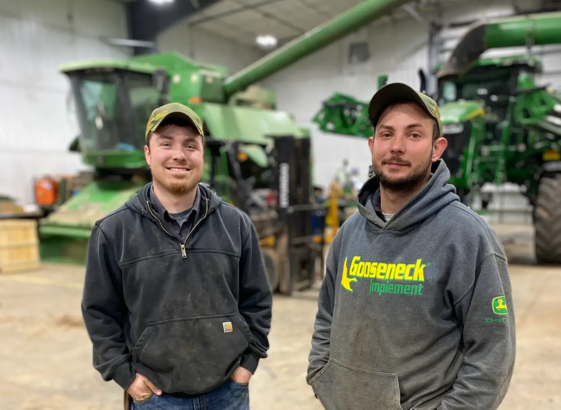 Two local service technicians at Gooseneck Implement in Elgin, Kristian Roth, left, and Rob Friesz, both graduated from the North Dakota State College of Science JDTECH Program.