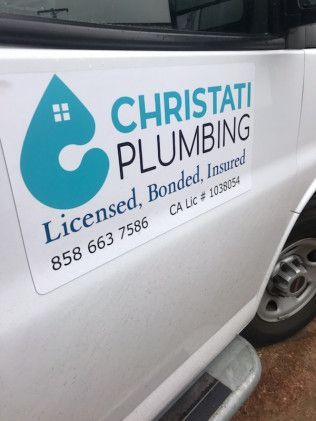 White van with “Christi Plumbing” logo, blue droplet icon, and contact info on the side.