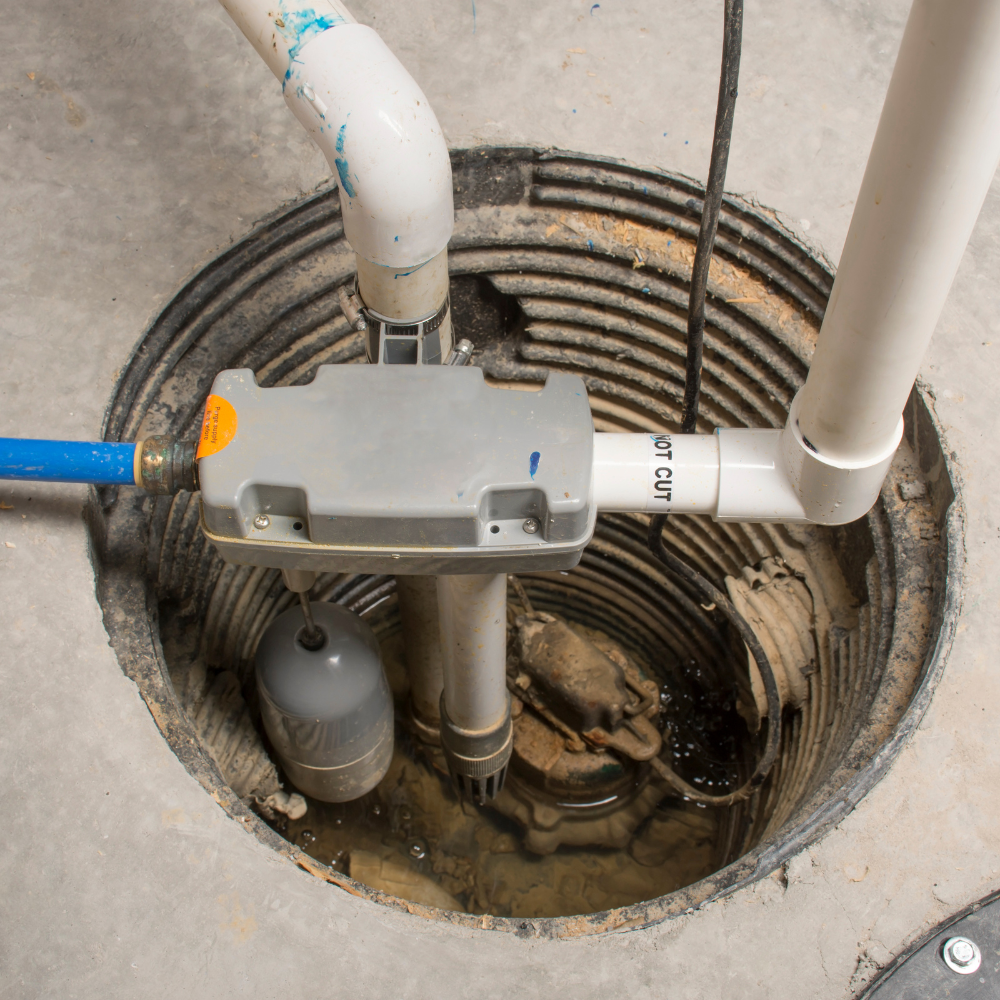 a close up of a sump pump in a basement