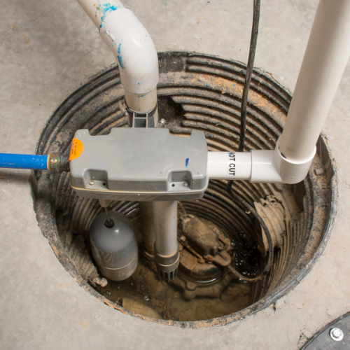 a close up of a sump pump in a basement .