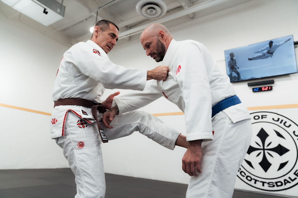 Students drilling Jiu-Jitsu escapes at Academy of Jiu-Jitsu Scottsdale in Scottsdale, AZ.