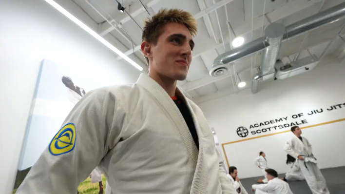 Adults practicing Brazilian Jiu-Jitsu drills at Academy of Jiu-Jitsu Scottsdale in Scottsdale, AZ.