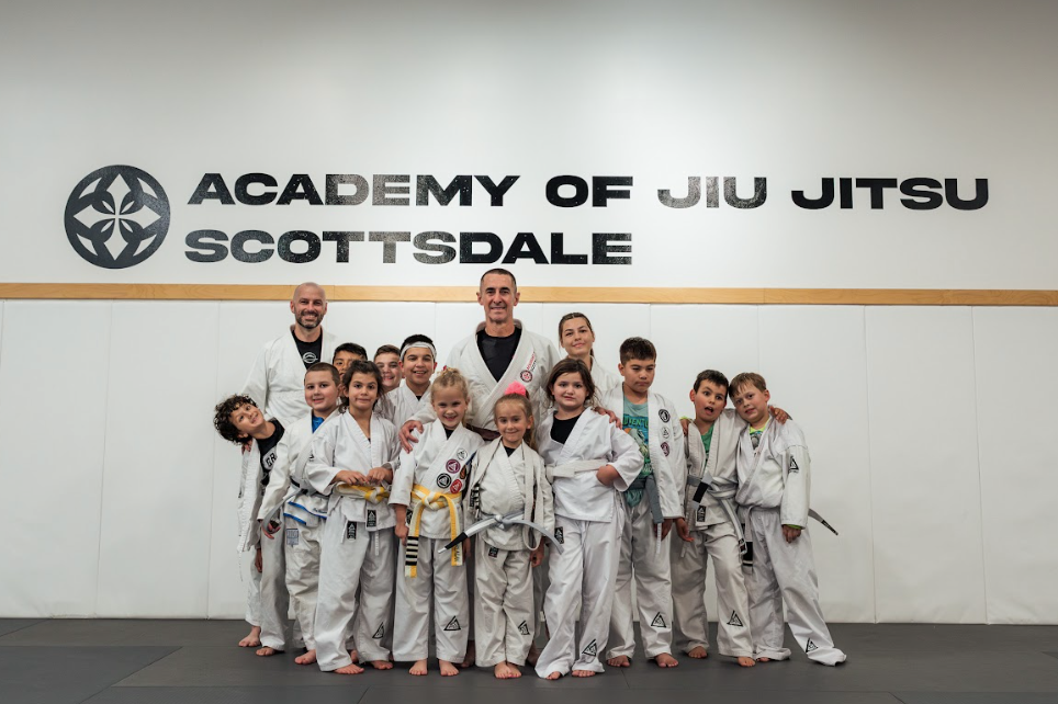 Women practicing controlled Jiu-Jitsu drills at Academy of Jiu-Jitsu Scottsdale in Scottsdale, AZ for confidence.