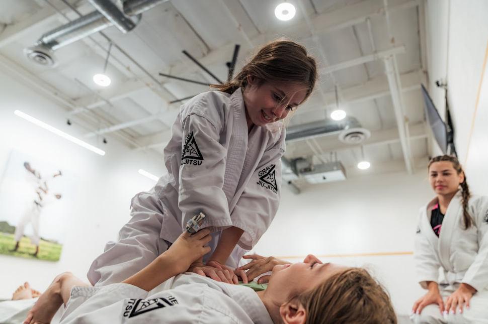 Students practice controlled Jiu-Jitsu grappling at Academy of Jiu-Jitsu Scottsdale in Scottsdale, AZ to build confidence.