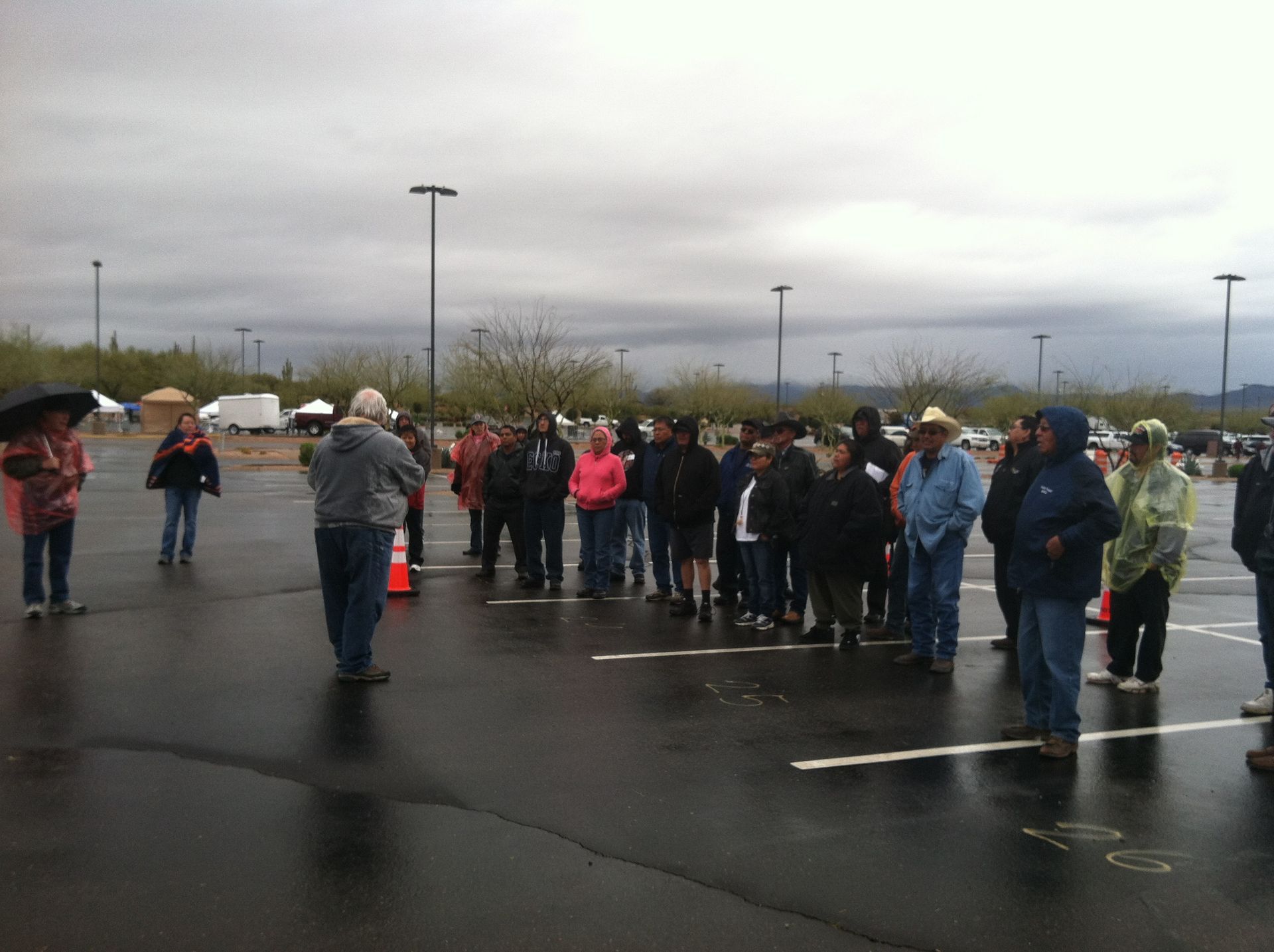 People standing in the rain