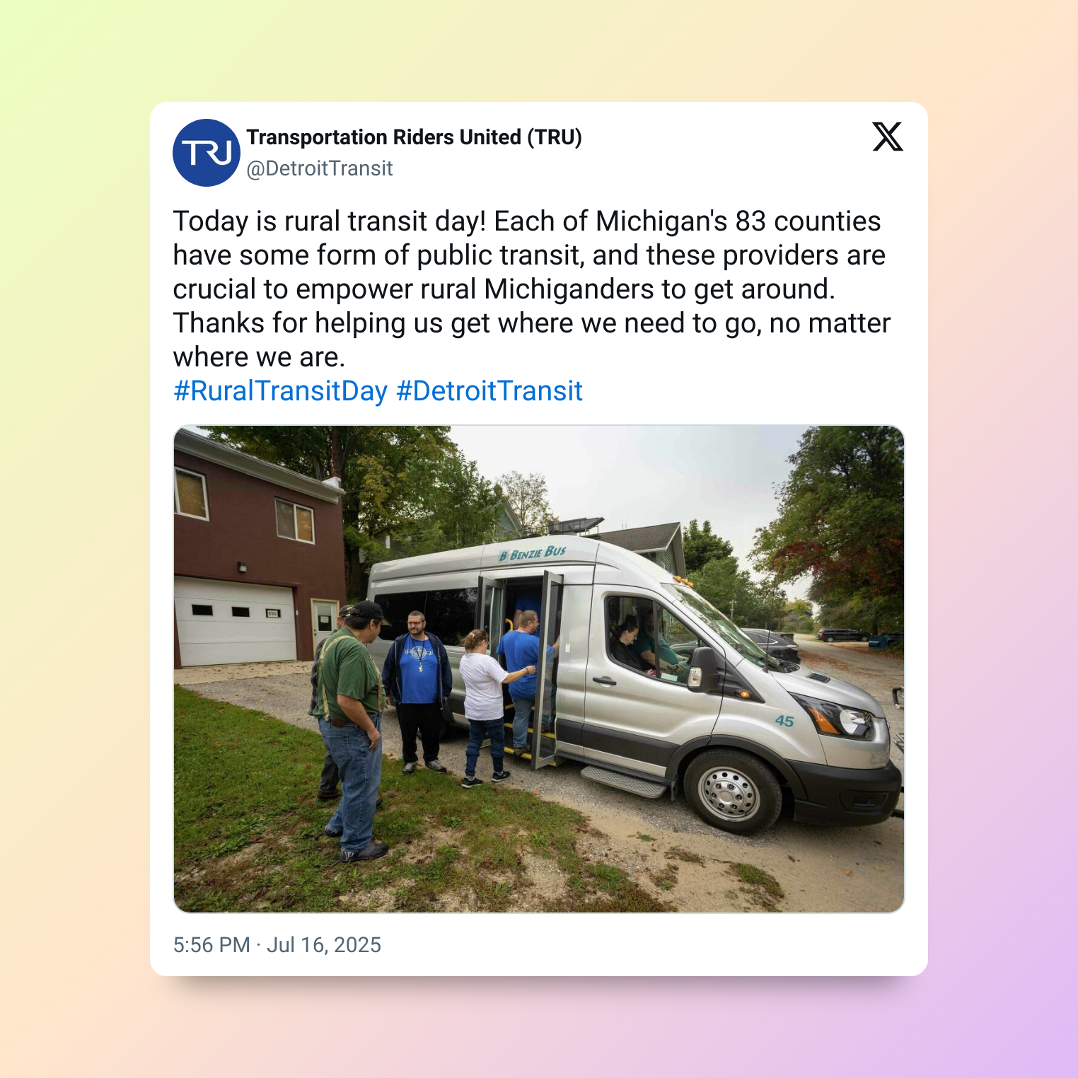 Tweet about rural transit day. People near a white transit van in Michigan.