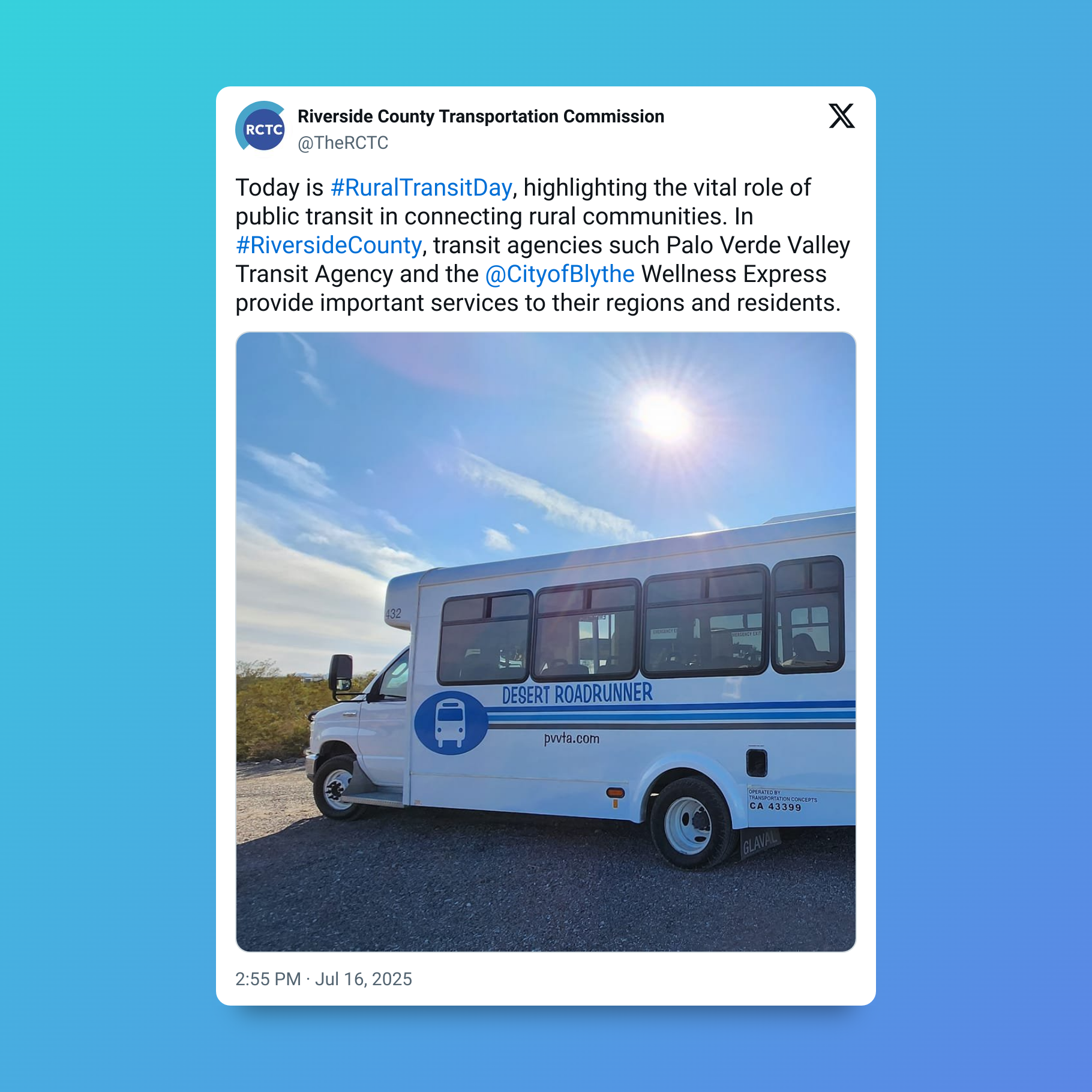 A white bus with blue stripes and the text 