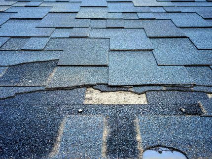 a close up of a roof with a hole in it .