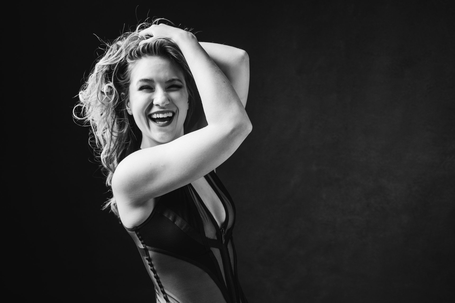 smiling boudoir portrait