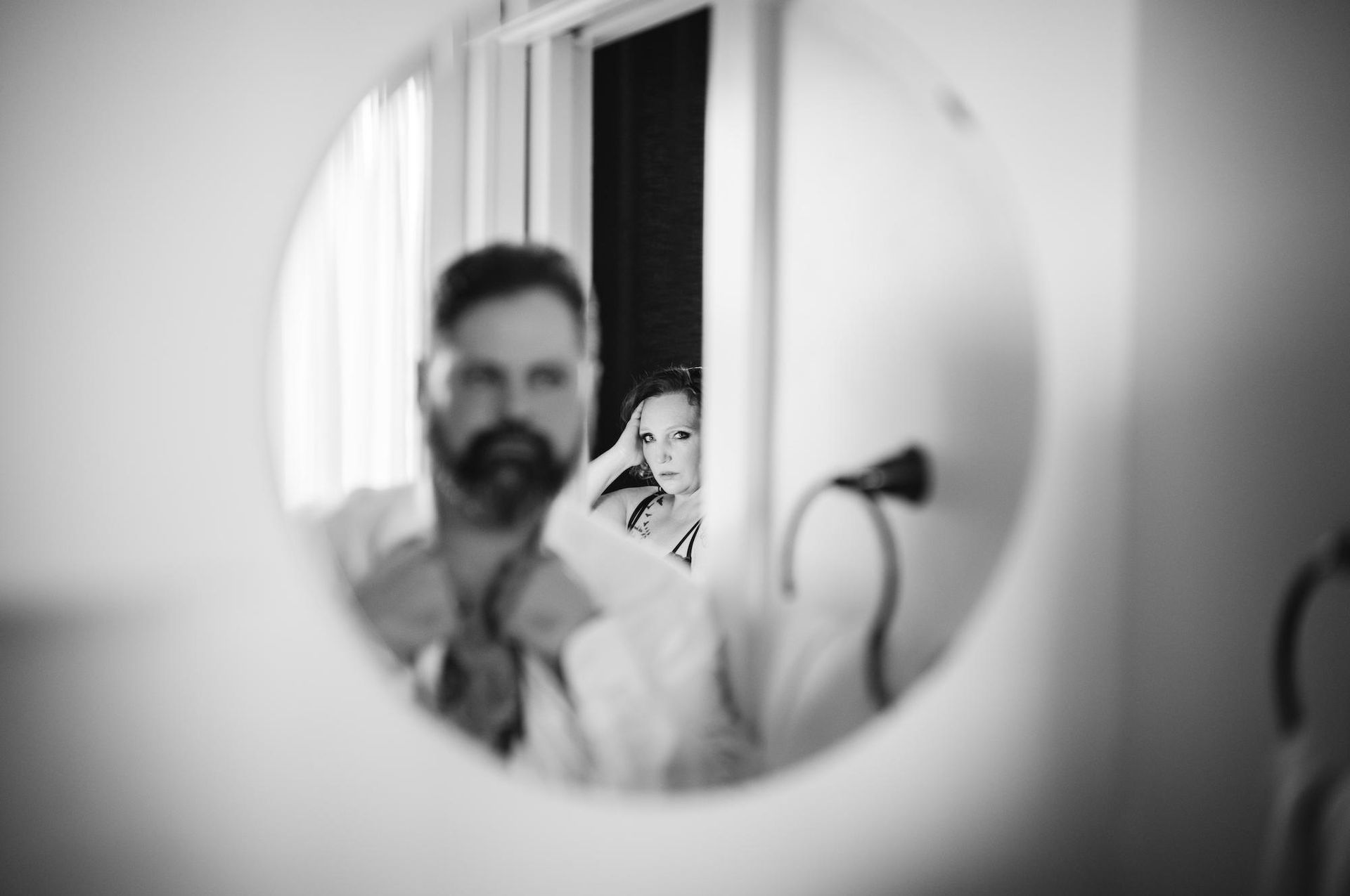 woman and man in the mirror
