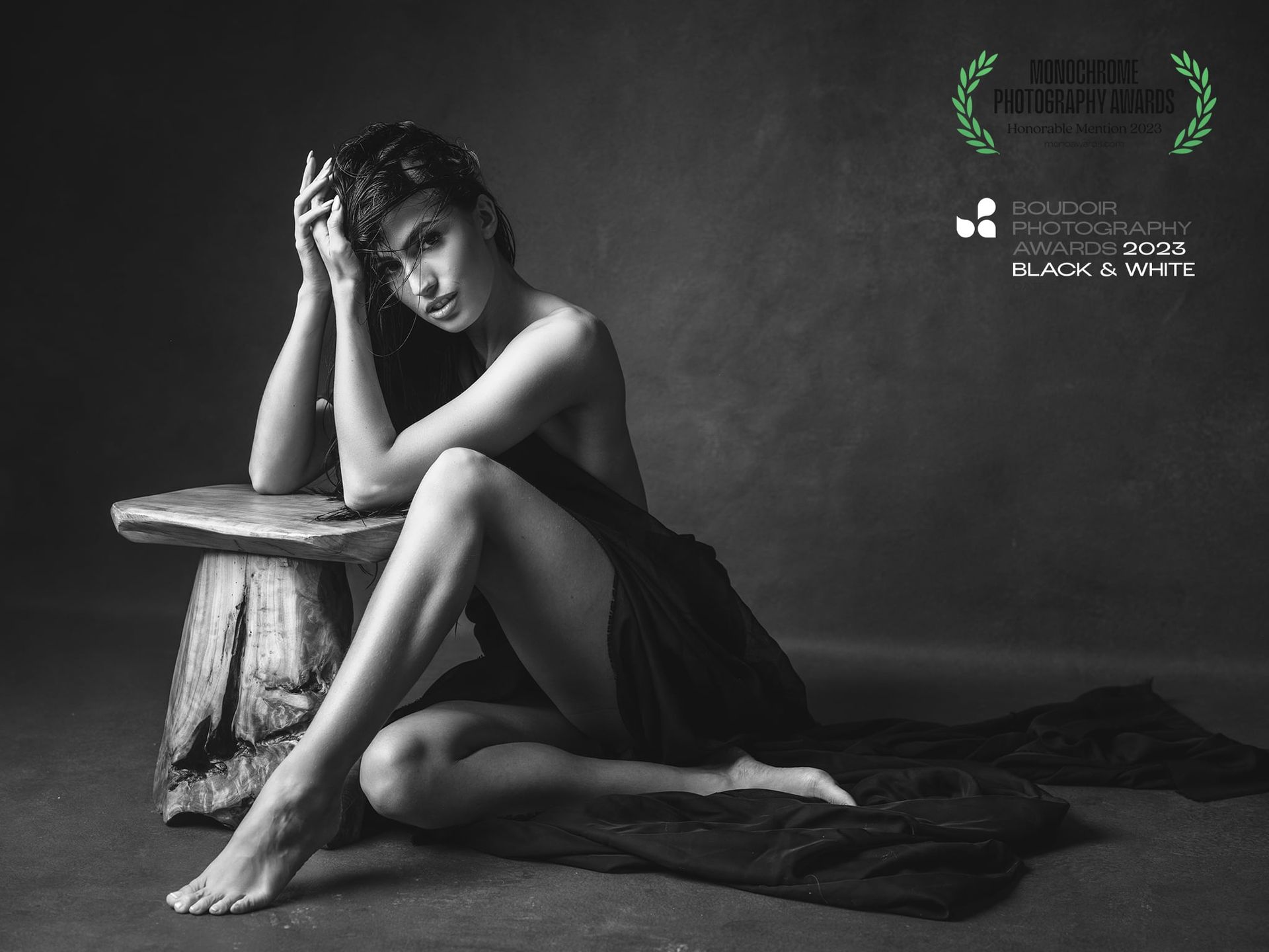 girl wearing lingerie in a black and white photo