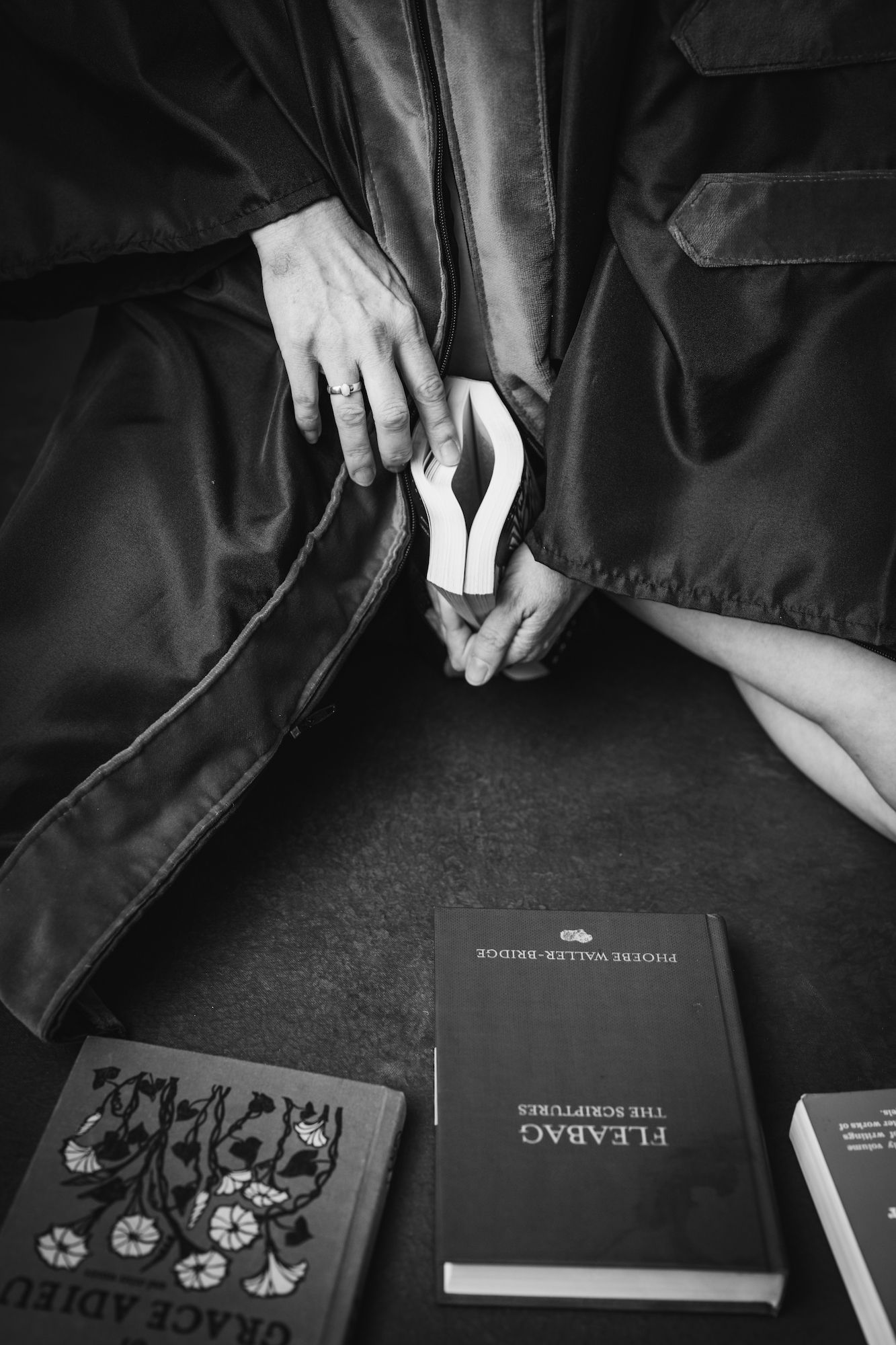 woman fingering book