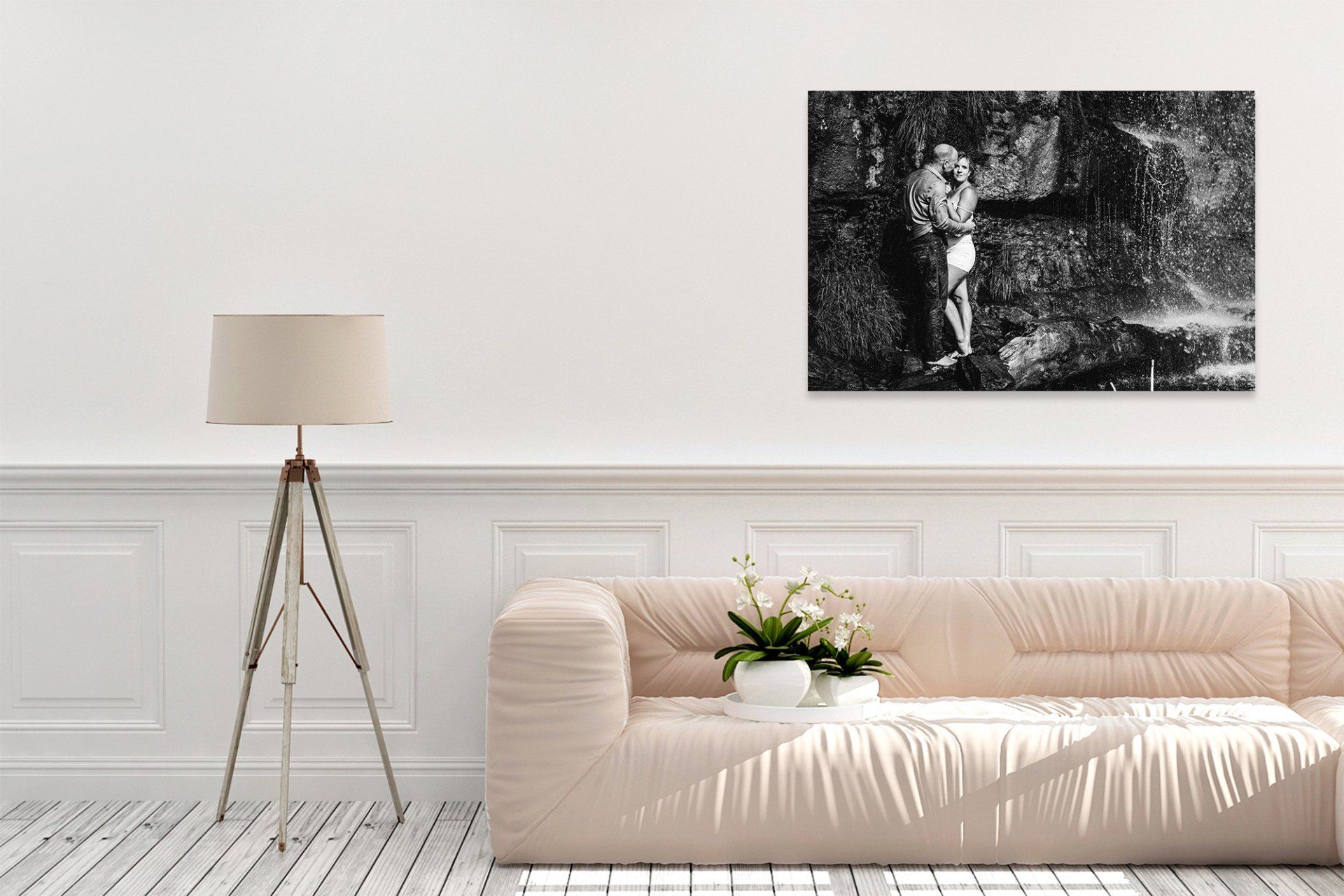 Vibrant art pieces displayed on clean white walls and polished wooden floors.