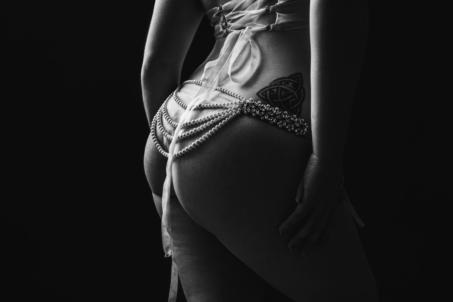 woman in a pearly outfit