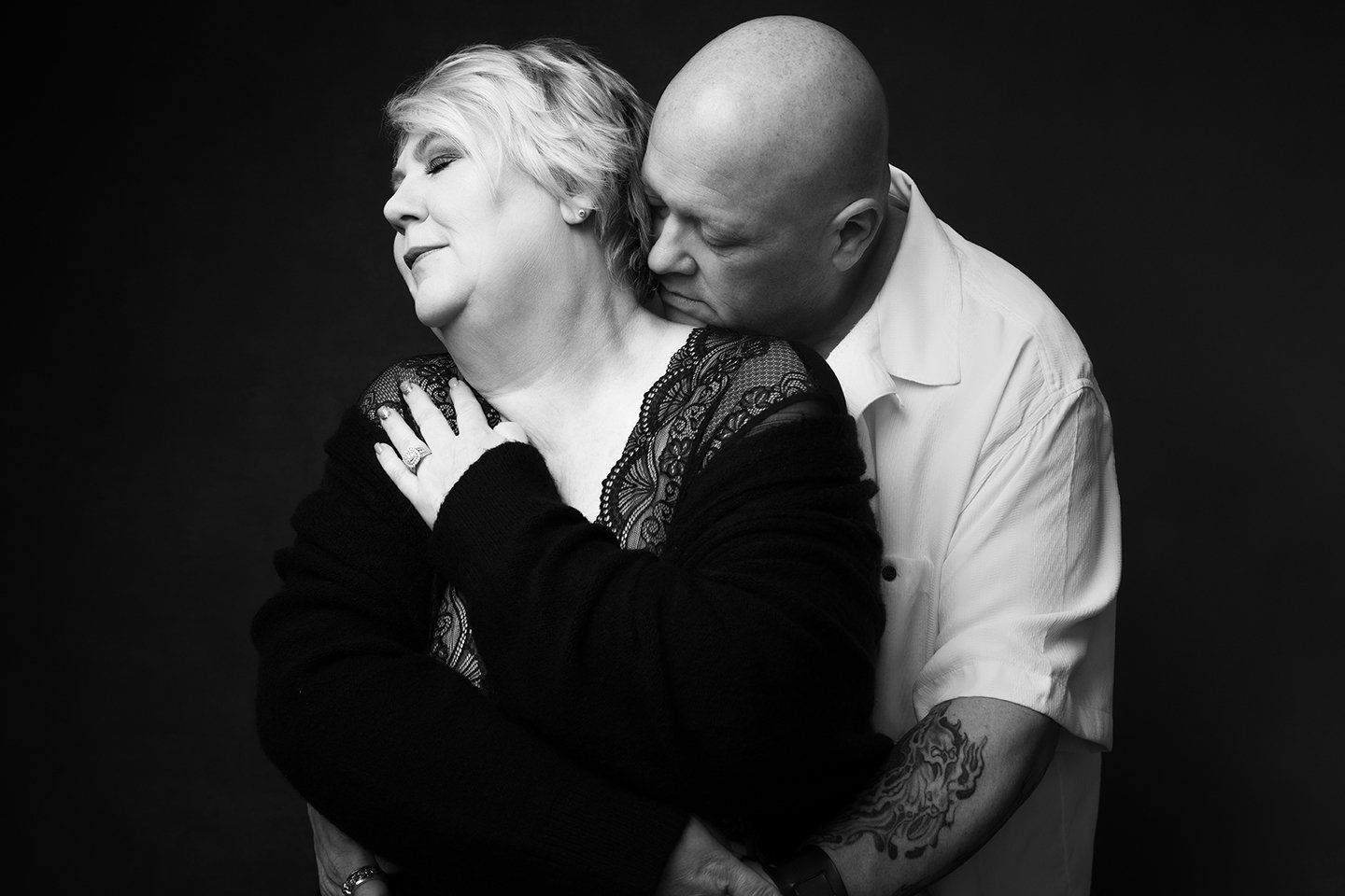 couples boudoir, man holding woman from behind