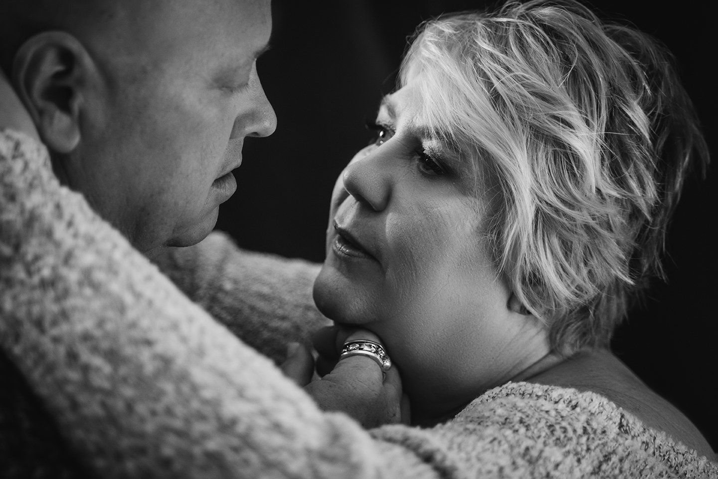 sexy couples shoot, couple staring into each other's eyes