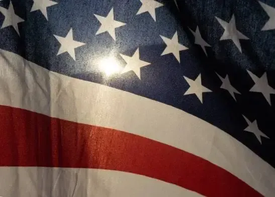 Close-up of an American flag with stars and red, white, and blue stripes