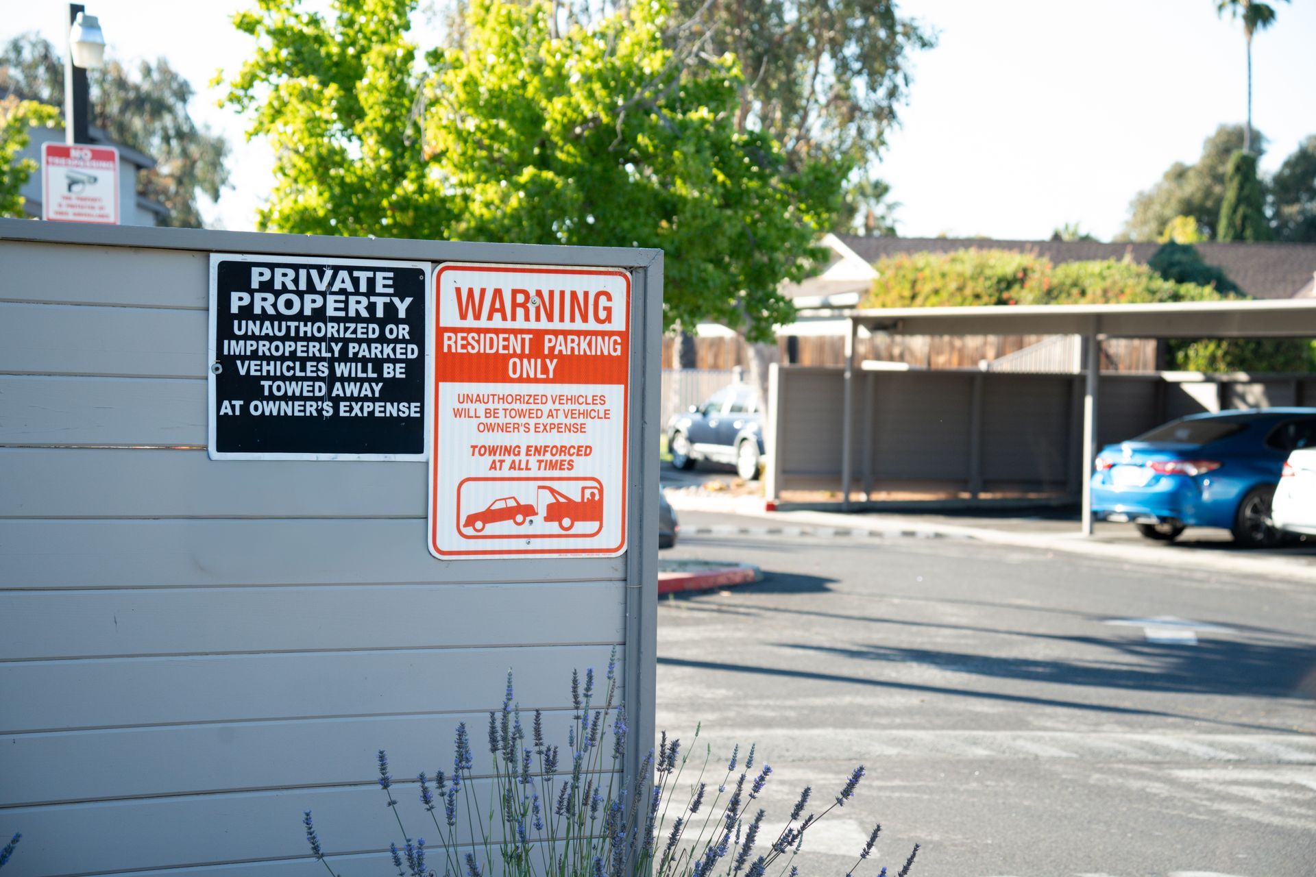 Warning signs posted for private property and resident parking enforcement in Plainfield, Indiana