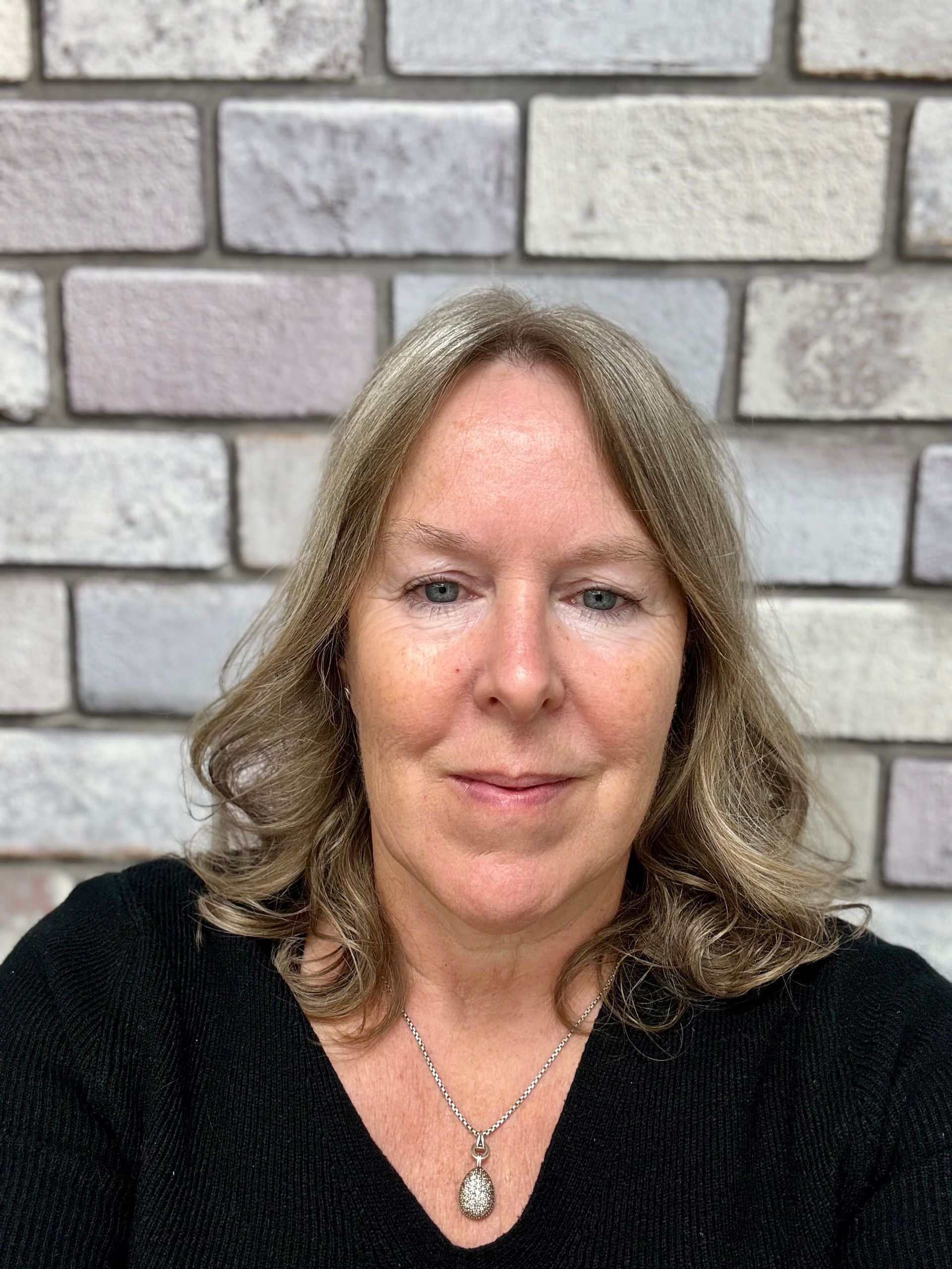 Sarah - Director & co-owner