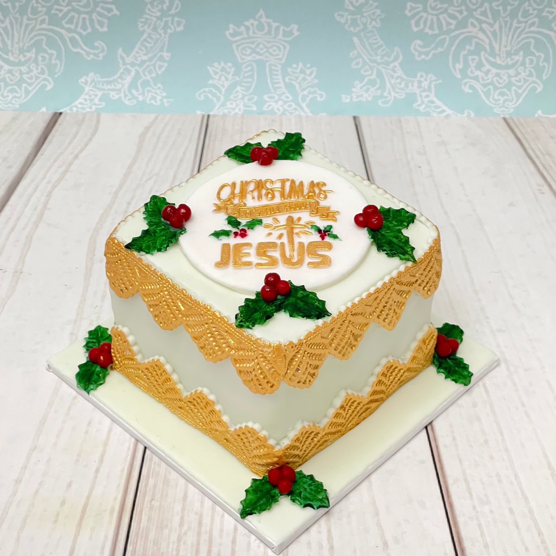 Christmas Cake With Holly, Gold Edible Lace and Gold Christmas Message -Jesus.