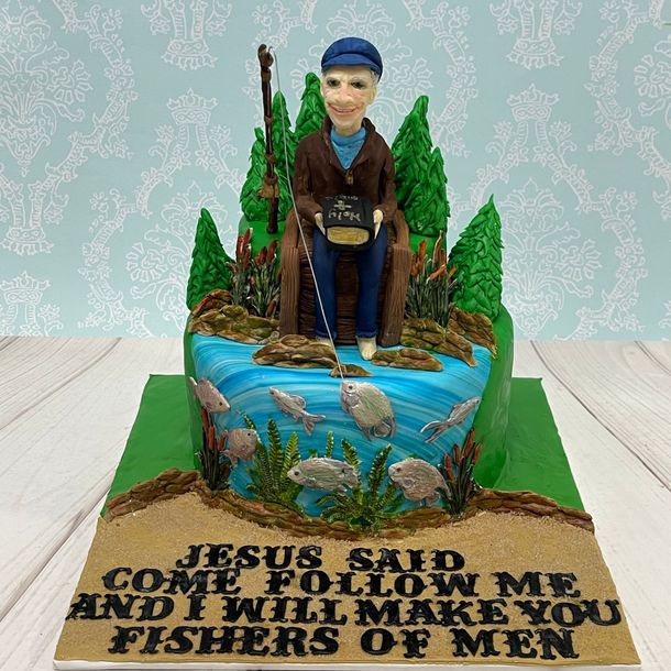 Fishing Theme Birthday Cake. with hand sculpted fishermen, fondant fish and other scenery. Christian theme also with little bible and verse.