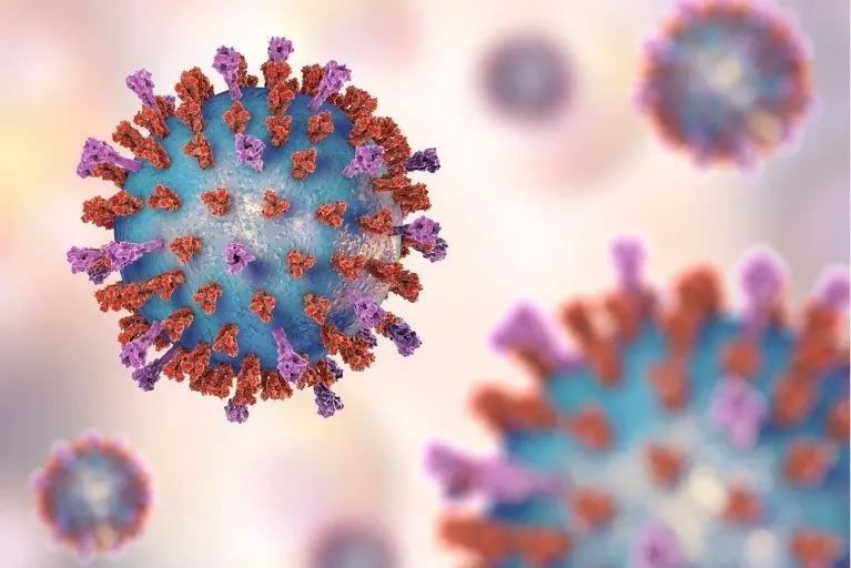 Close-up illustration of a coronavirus particle with spike proteins on a soft pink background