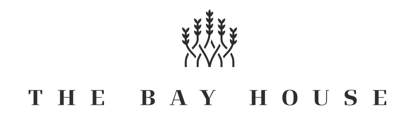 An official logo of the Bay House Restaurant in Naples
