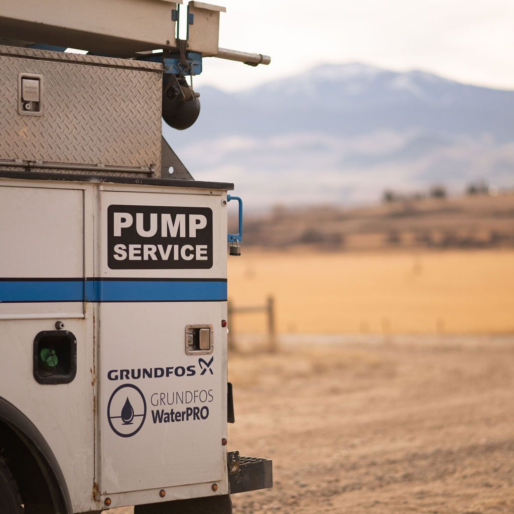 A white service truck branded 