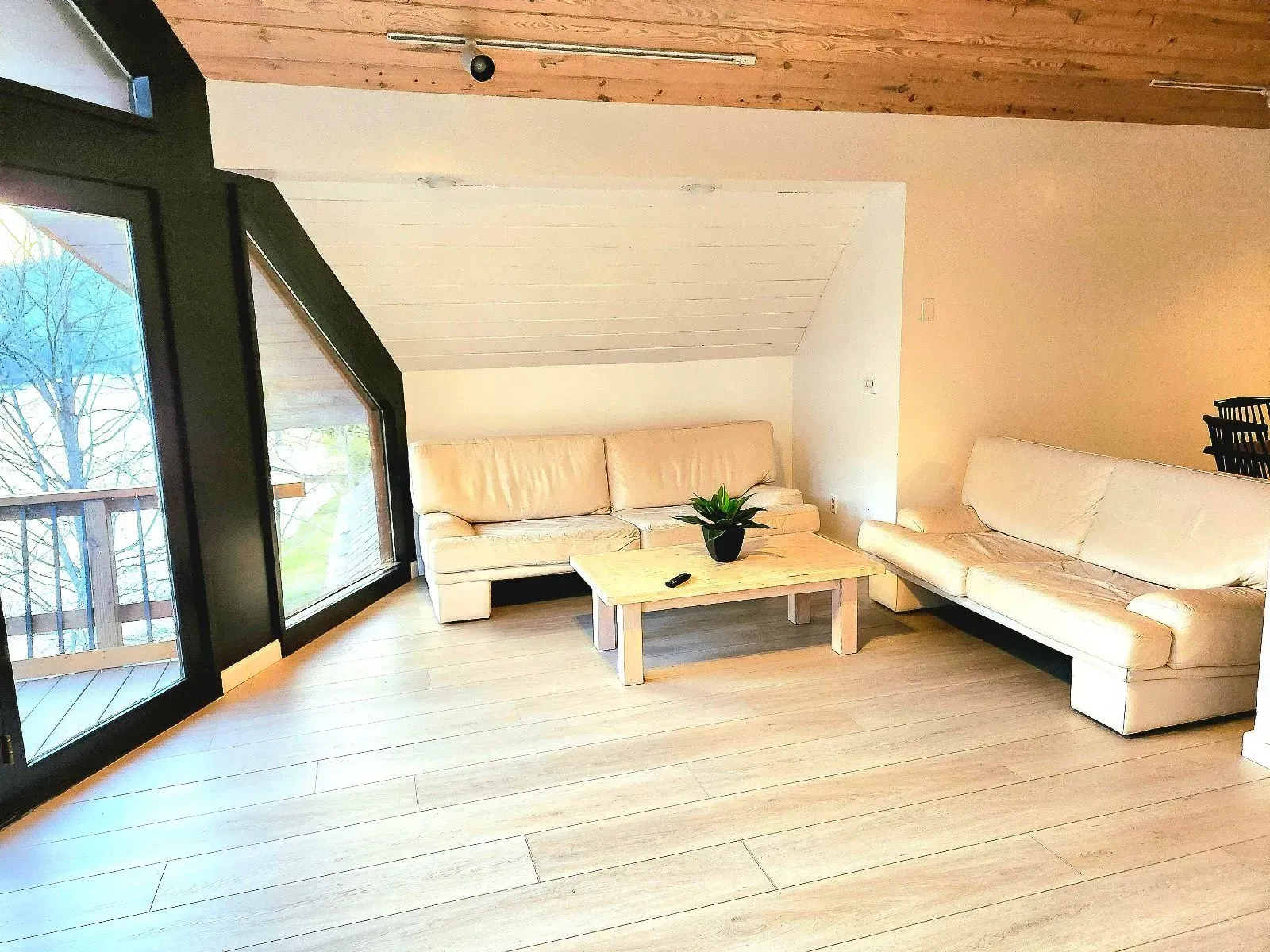 A living room with a couch and a coffee table