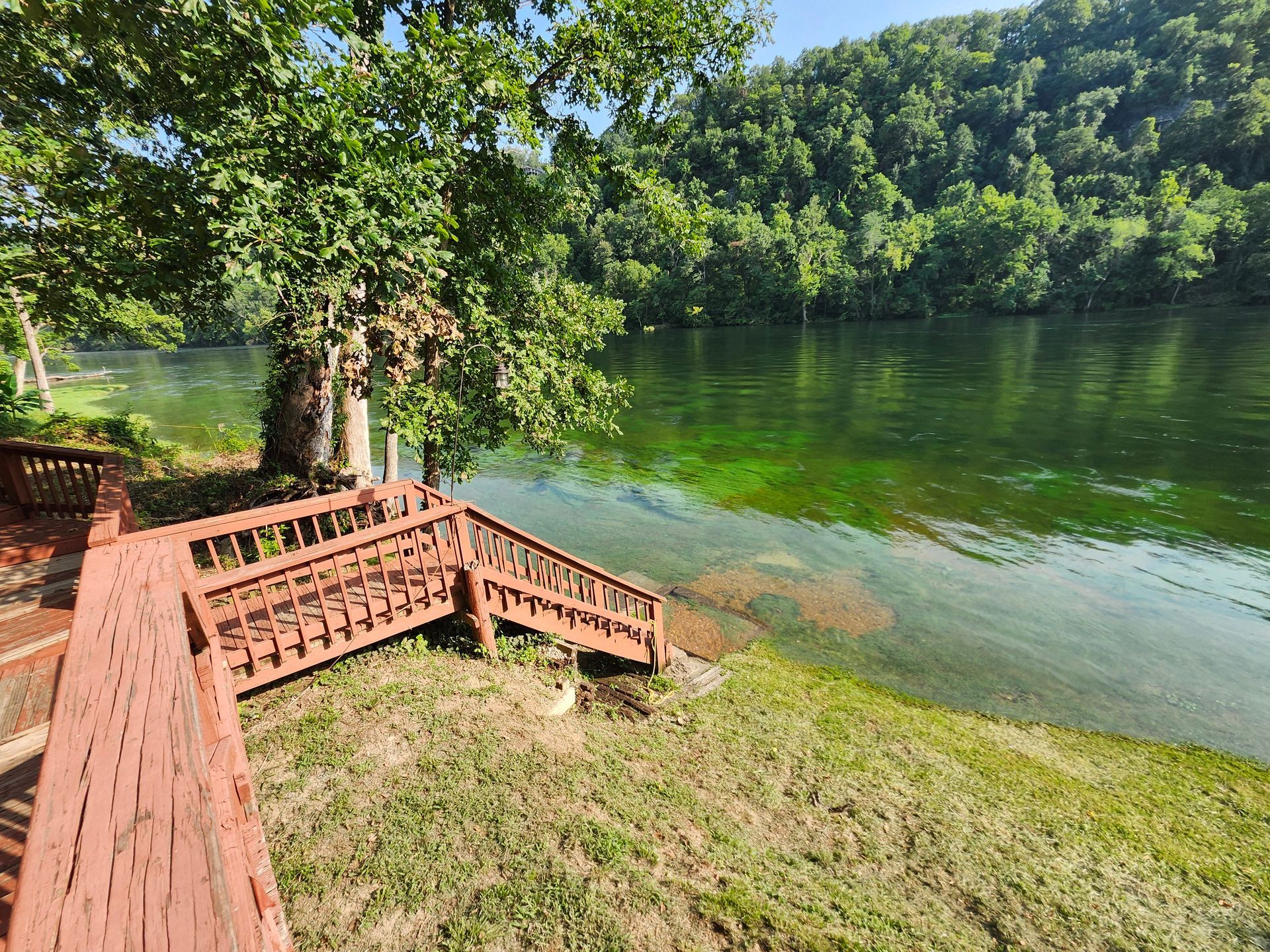 wooden walkway from cabins to white river copper johns resort