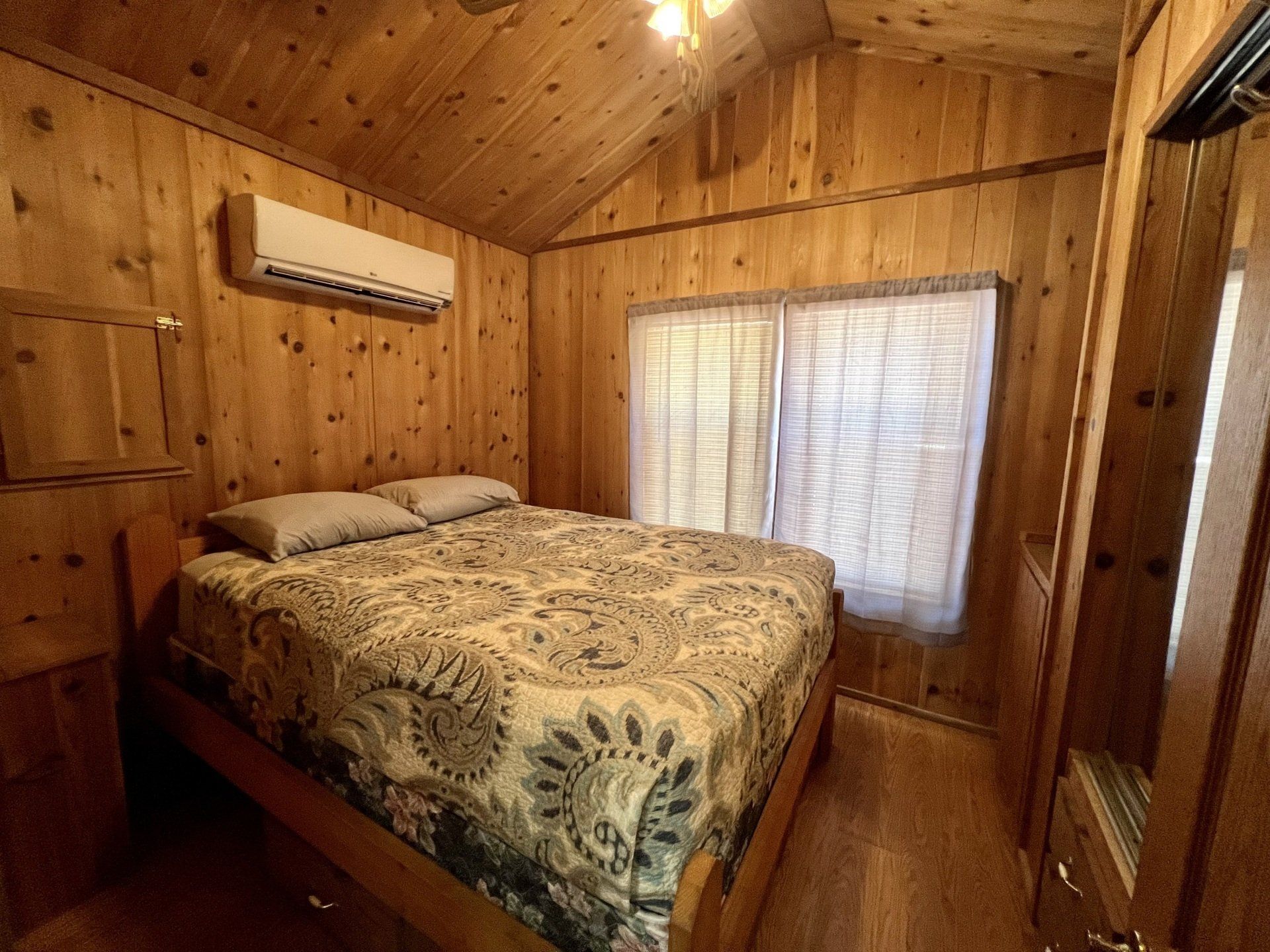 anna kay cabin bedroom with mini split