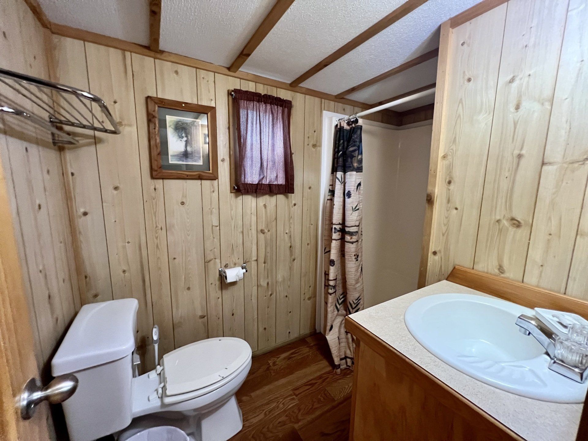 rustic bathroom in humpy fly cabin at copper johns resort