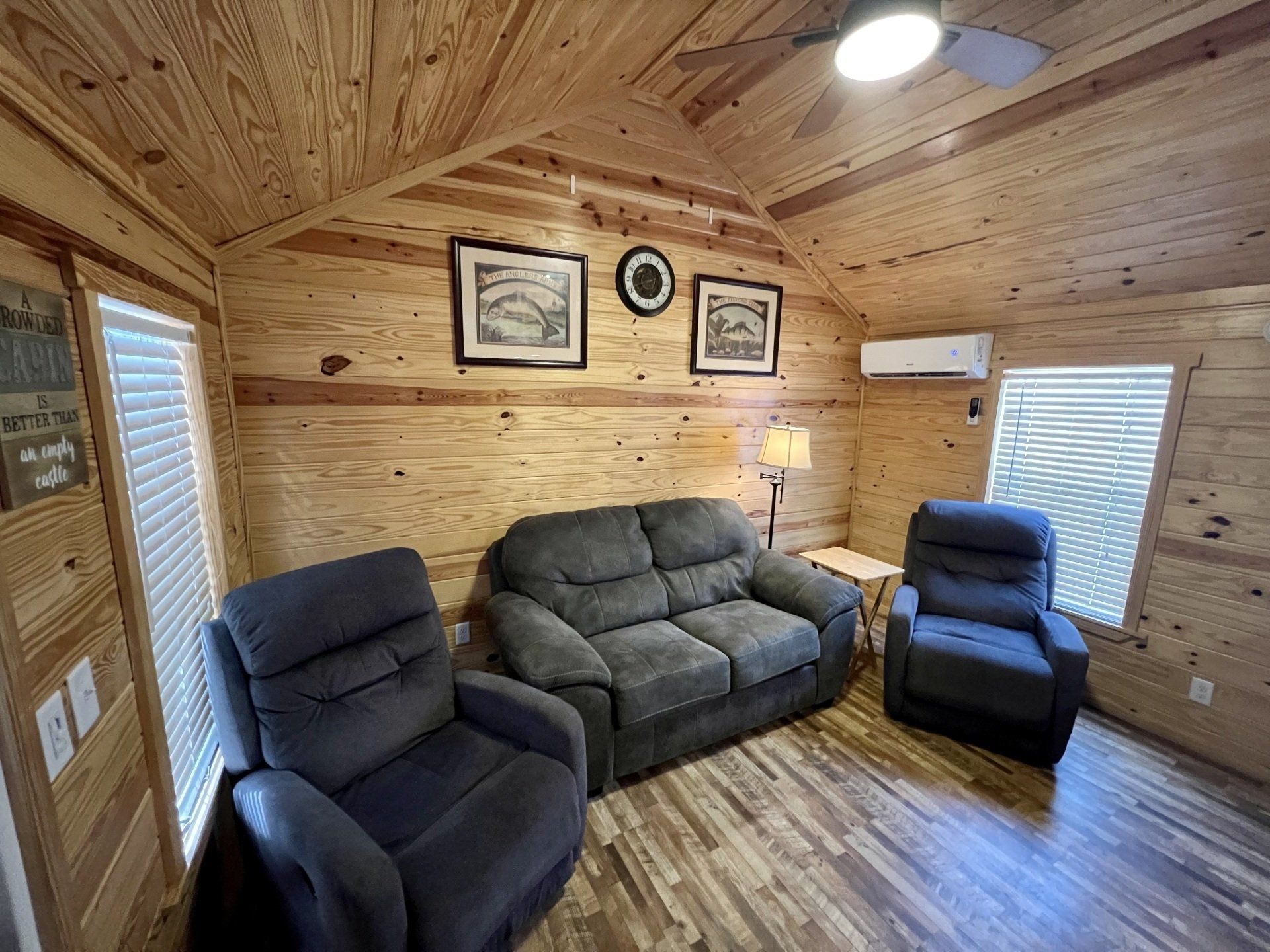 sofa and two recliners in zoo cougar cabin at copper johns resort