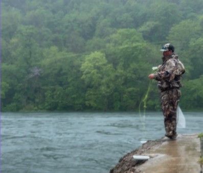 fly fishing in the rain white river near copper john's resort in lakeview arkansas