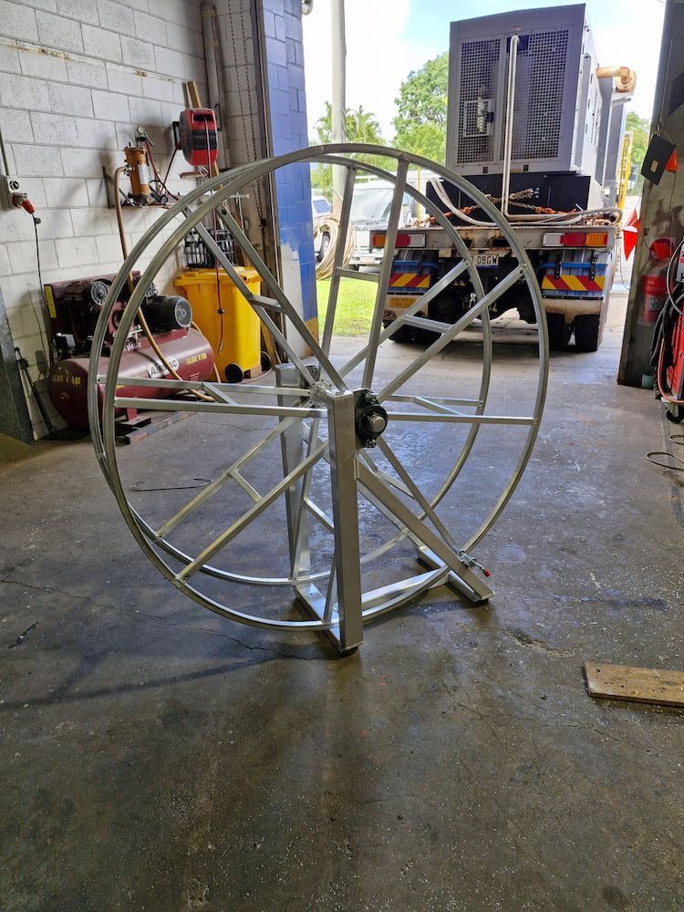Large Metal Cable Reel in a Garage, With a Truck Visible in the Background — Cairns Metal Works in Portsmith, QLD
