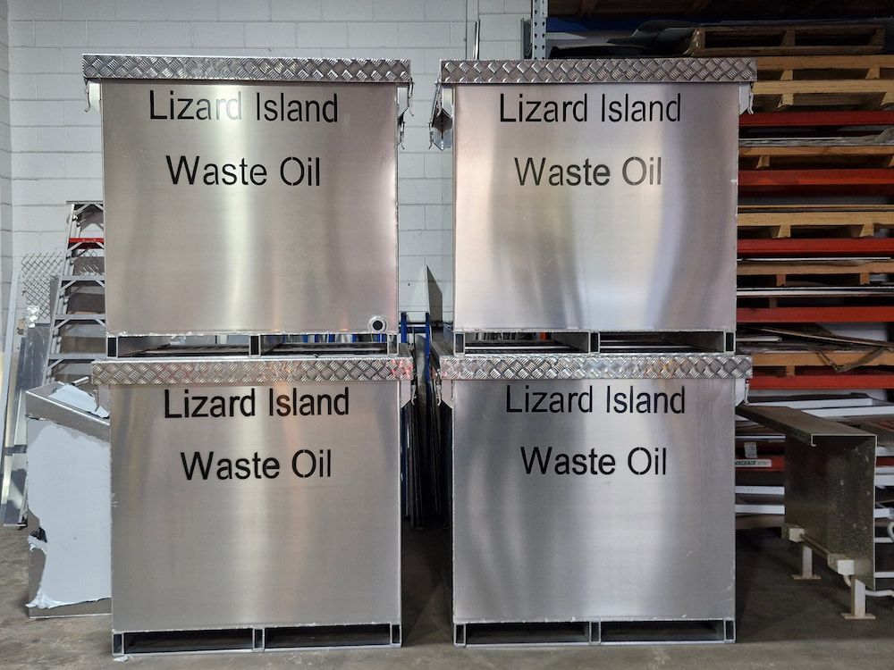 Four Metal Waste Oil Containers — Cairns Metal Works in Portsmith, QLD