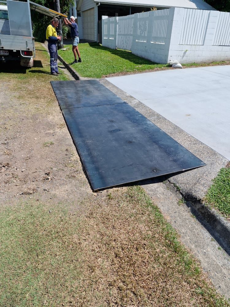 Black Ramp on a Curb, Providing Access to the Driveway — Cairns Metal Works in Portsmith, QLD