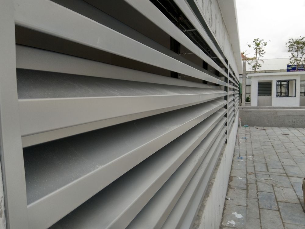 Gray, Horizontal Slatted Fence — Cairns Metal Works in Portsmith, QLD
