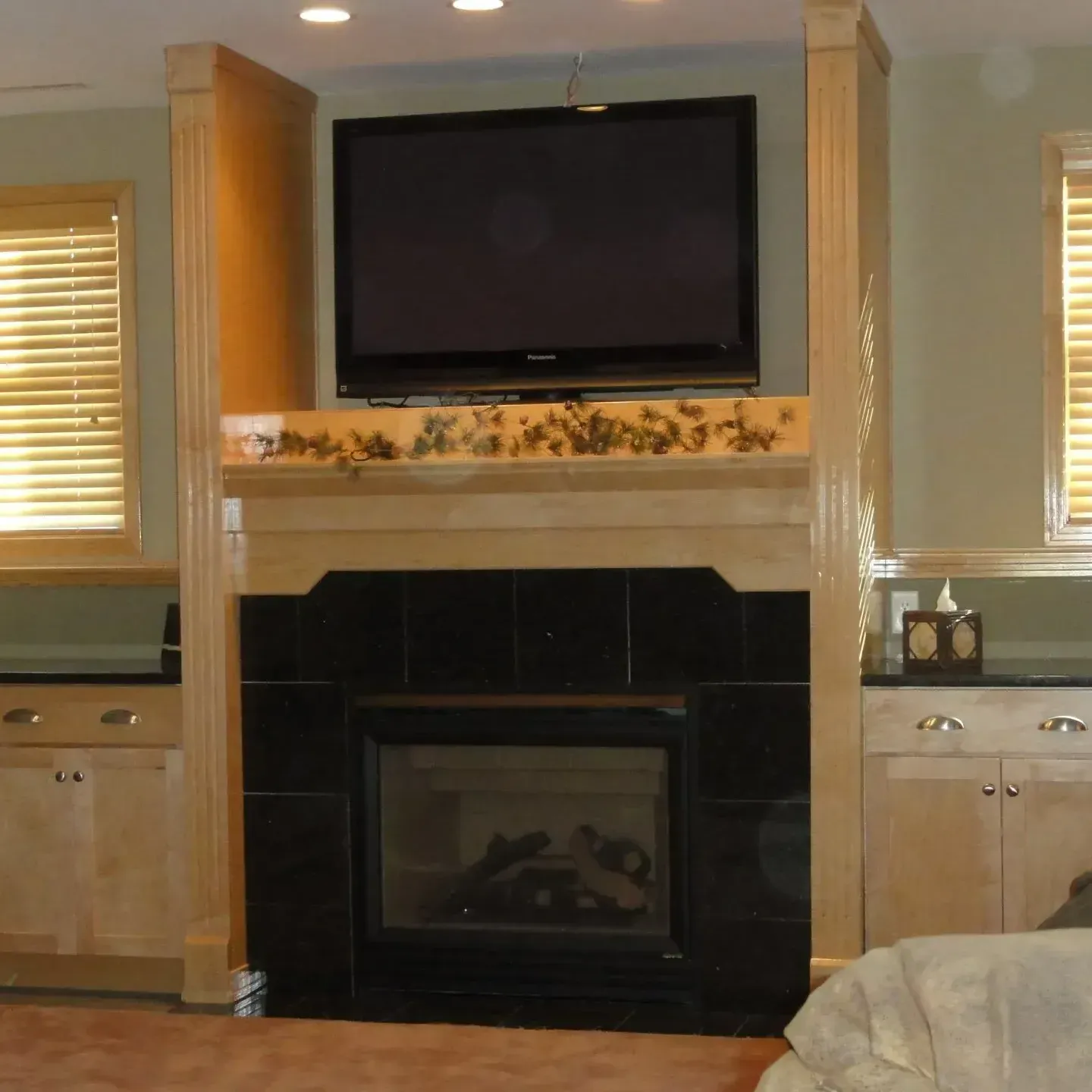 Flat Screen TV and Fireplace — Iowa City, IA — Olson Remodeling & Construction