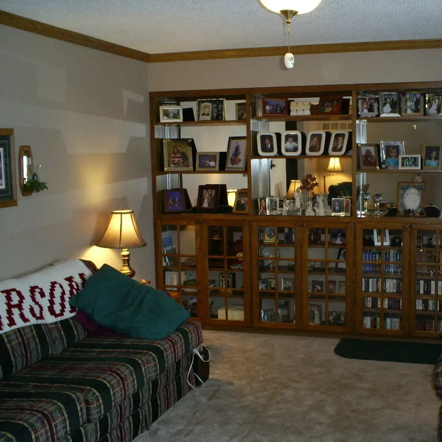 Room with a Shelf with Lots of Picture — Iowa City, IA — Olson Remodeling & Construction